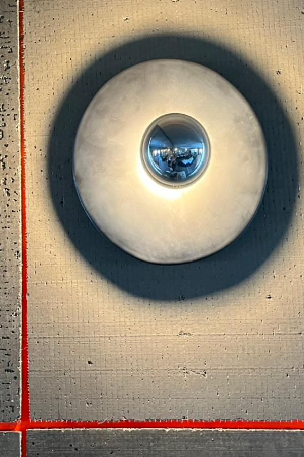 A composition of steel, ceramic and mirror